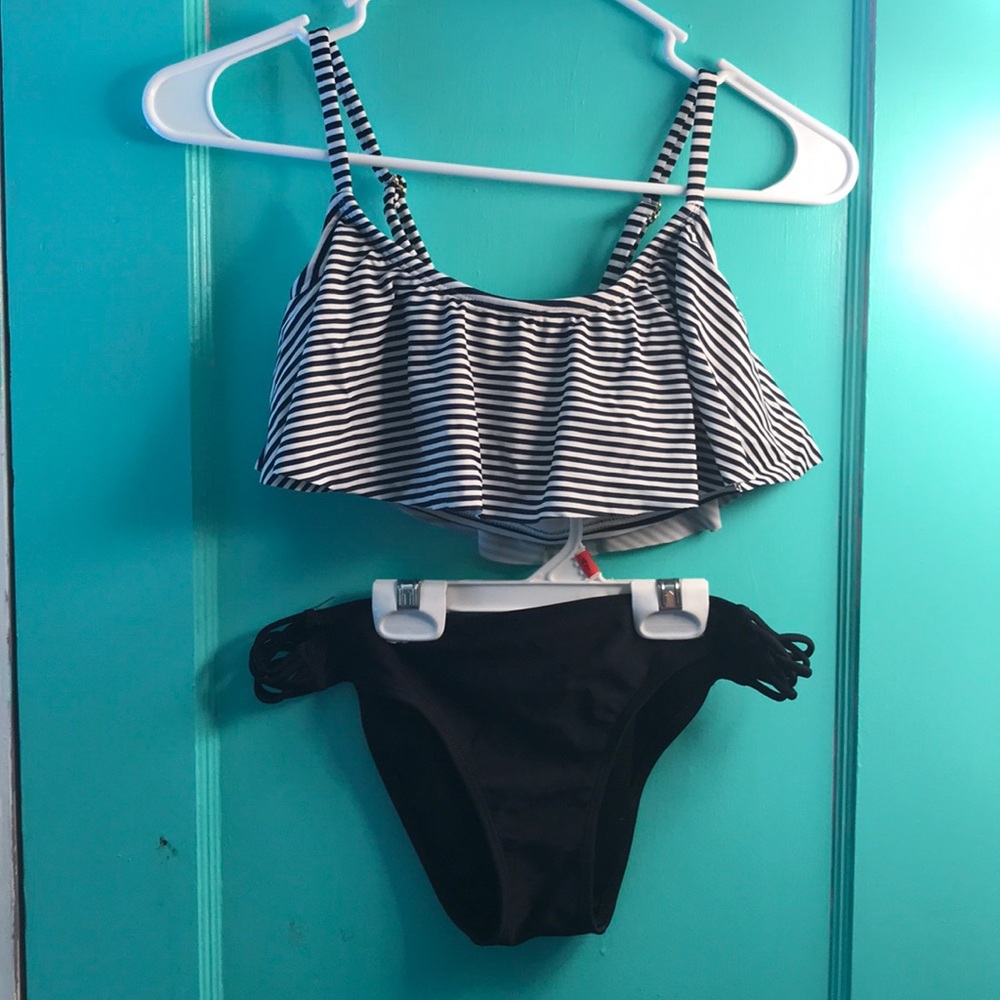 striped ruffle bikini top and solid black bottoms